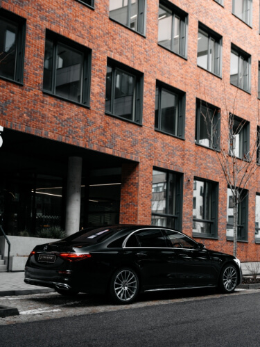 Mercedes-Benz S Class outside of an office building in England.