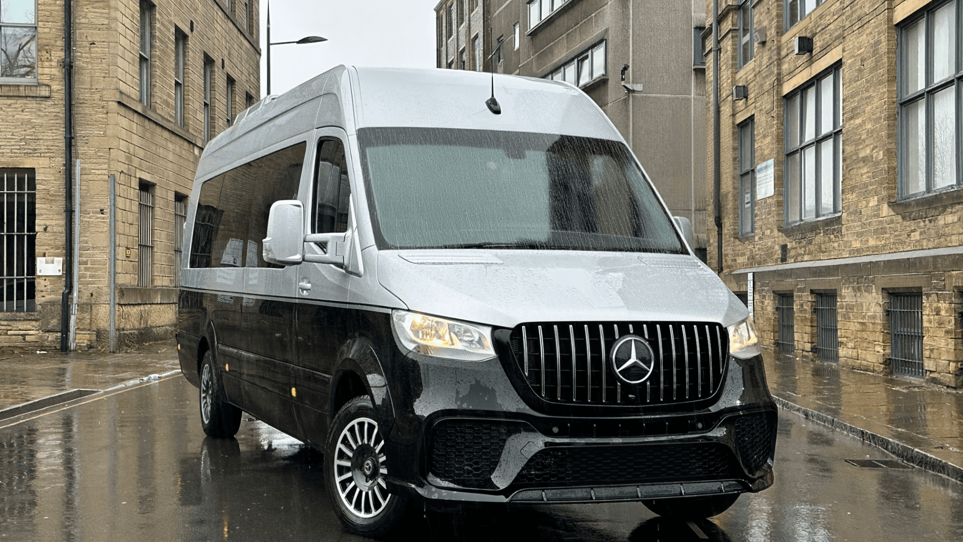 Mercedes-Benz mini-coach with silver and black two tone paint.