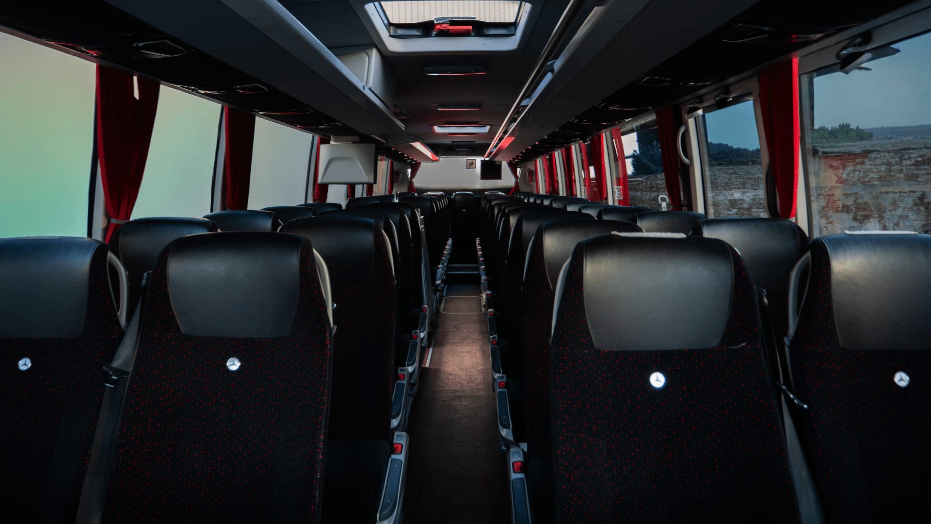 Interior of luxurious 70 seater Mercedes-Benz coach.