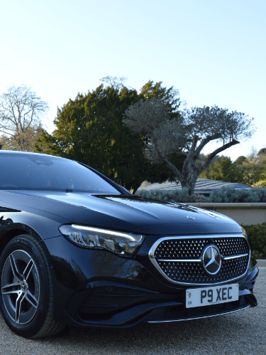 Black mercedes benz e class saloon parked outside Grantley Hall in Ripon at a private function.
